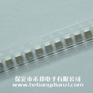 �NƬ���3300pF(3.3nF) ���͉�500V  1210